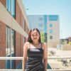 Portrait photo of a smiling woman with a positive attitude.